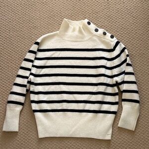 Elegant Striped Button-Shoulder Turtleneck Sweater - Black and White